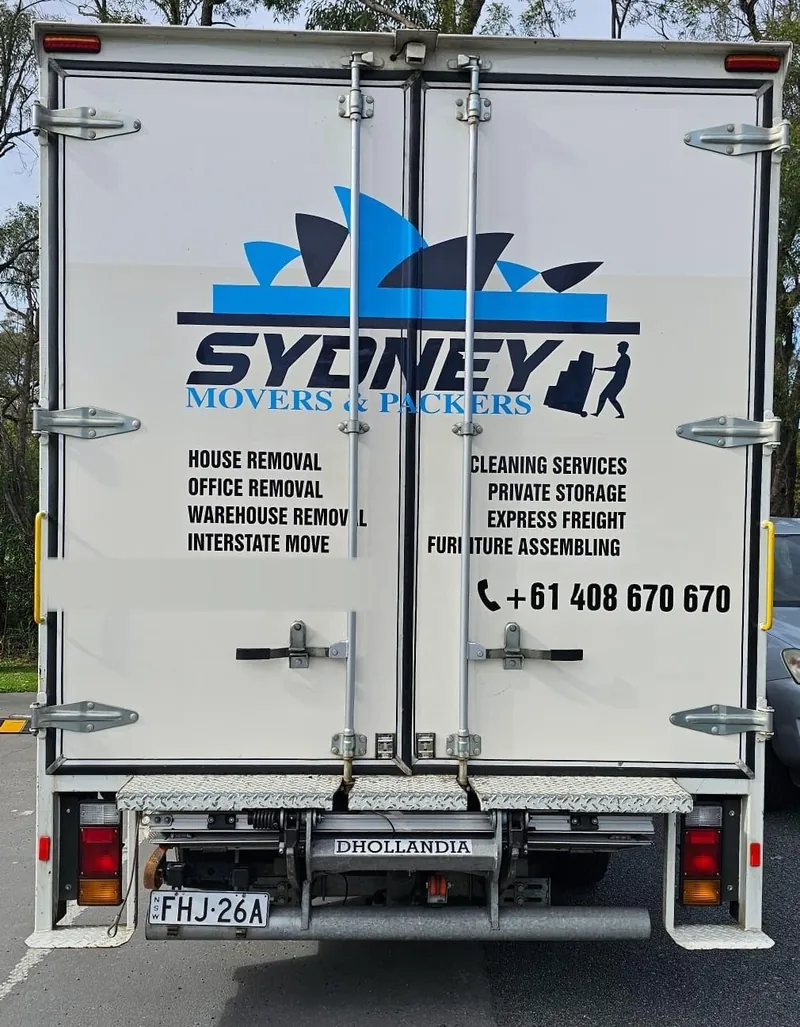 Sydney Movers and Packers truck, rear doors open for loading